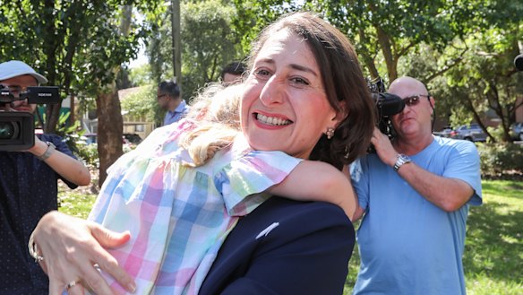 Premier Gladys Berejiklian celebrates in her electorate, Willoughby, on Sunday. 