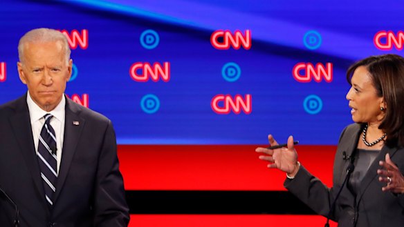 Former Vice President Joe Biden listens as Senator Kamala Harris speaks as former Vice President Joe Biden listens. 