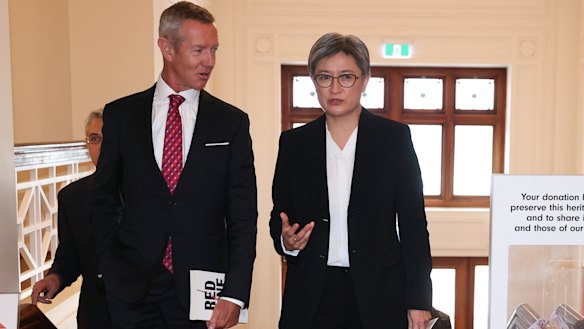 International editor Peter Hartcher and Senator Penny Wong at the launch of Hartcher’s book, Red Zone: China’s Challenge and Australia’s Future, at the Museum of Australian Democracy (Old Parliament House) on Wednesday.
