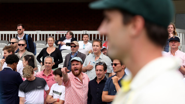 Australian captain Pat Cummins looks on as fans have their say at Lord’s.