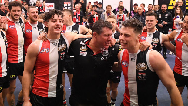 St Kilda caretaker coach Brett Ratten celebrates with his side on Sunday.