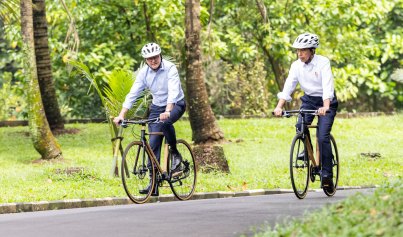 Prime Minister Anthony Albanese and   Indonesia President Joko Widodo cycle around the grounds of Bogor Palace, West Java, last June.