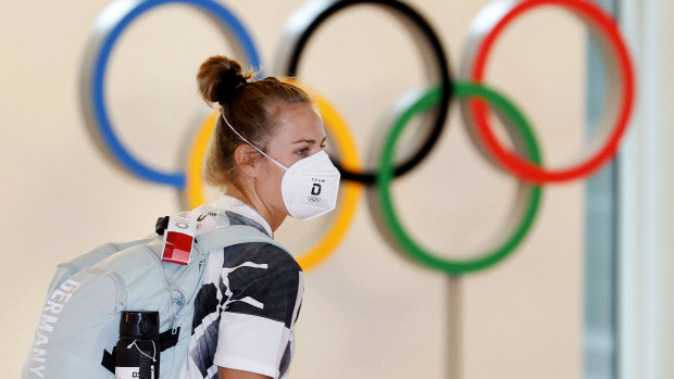 A German Olympic team athlete arrives at Haneda airport in Tokyo on July 1. The Games could be held under a state of emergency as COVID-19 infections rise in the city.