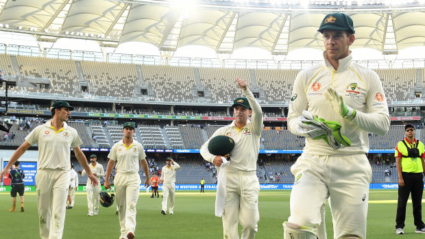 Victory in sight: Australian captain Tim Paine leads his men off the field on day four.