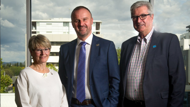 Chief Minister Andrew Barr (centre) at the charity's funding round announcement with the chair of the Hands Across Australia board, Diane Kargas Bray, and chief executive Peter Gordon. Photo: Elesa Kurtz