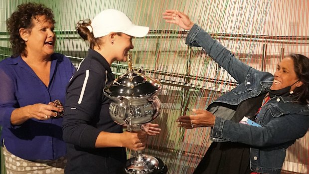 Ash Barty celebrates with Evonne Goolagong Cawley and Cathy Freeman.