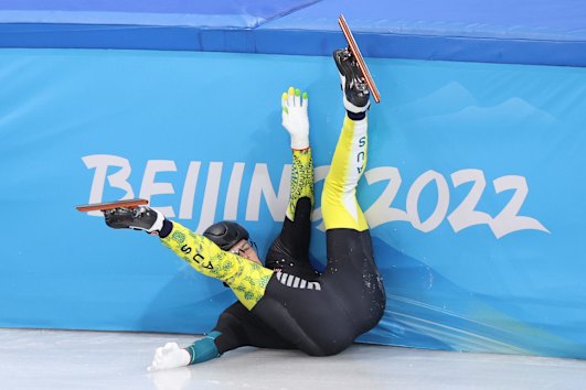 Brendan Corey crashes during the men’s 1000m quarter-finals in the Beijing 2022 Winter Olympic Games.