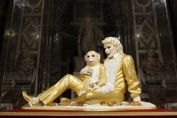 US artist Jeff Koons’ sculpture “Michael Jackson and Bubbles” as displayed at the Versailles Palace in 2008.