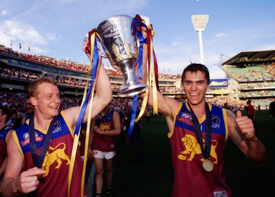 Michael Voss and Simon Black celebrate another of the three premierships wins in the 2000s.