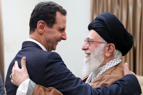 Iran's Ayatollah Ali Khamenei, right, welcomes Syrian President Bashar al-Assad in Tehran, Iran in February.