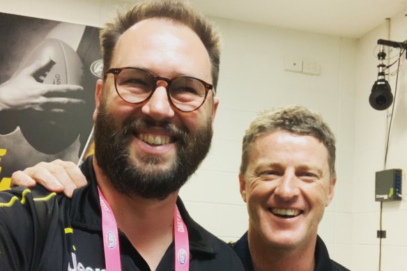 Behind the scenes: Konrad Marshall with Richmond coach Damien Hardwick.