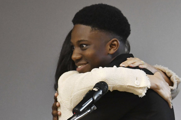 Meghan embraces head boy Aker Okoye. He later said: "She really is beautiful, innit."