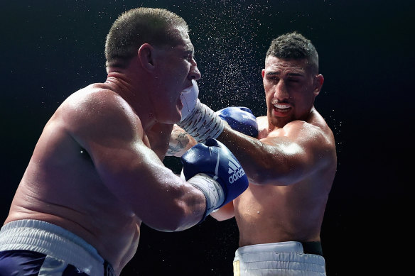 Justis Huni lands a left hand on Paul Gallen during his win over the former league star.