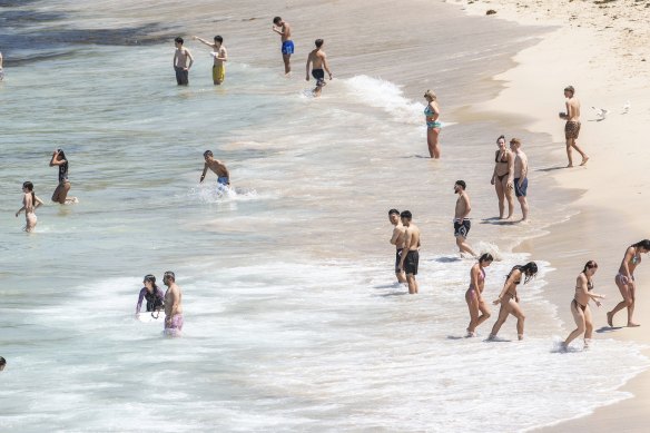 Sydneysiders enjoy perfect summer weather at Bro<em></em>nte Beach on Monday.