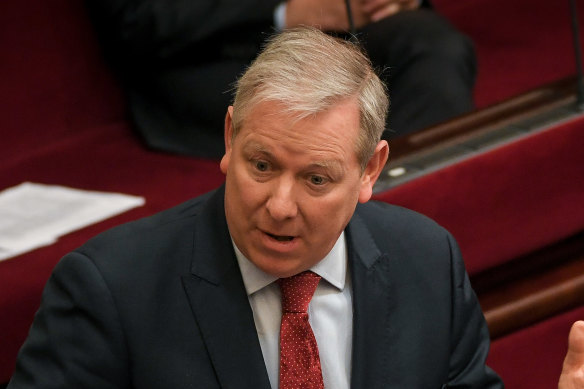Liberal MP David Davis rises during question time.