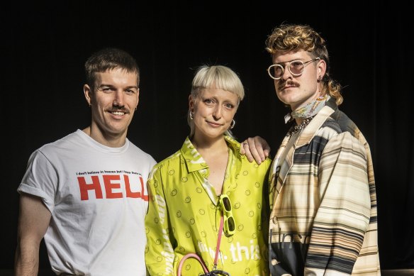 Guests at the Alix Higgins show at Australian Fashion Week, (from left) Sam Passmore, Annaliese Griffith-Jones and Russell Phillip.