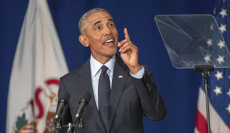 Former US president Barack Obama speaks in Foellinger Auditorium at the University of Illinois at Urbana-Champaign on Friday.