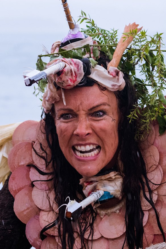 Actress Jo Bloom performs the character Caliban in The Tempest on Sydney Harbour. 