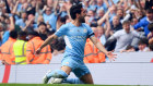Ilkay Guendogan of Manchester City celebrates after scoring their team’s third goal during the Premier League match between Manchester City and Aston Villa.
