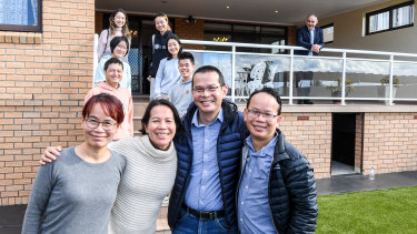 Four of the six Chu children, along with some of their children at the back, who grew up in their beloved family home since 1972. (L-R Kyle, Susan, John and Colin Chu)