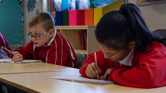 Emu Plains Public School year 3 students work at a distance during the phased return to school.