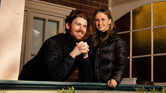 Luisa Low and Richard Moore have both kept their jobs and find they are saving money because of lack of opportunity to spend it.