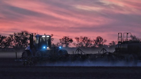 Farming industry in flux: A farmer tills a field near Walgett in north-western NSW in mid-May 2020: 