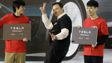 Elon Musk tries to woo the growing market in China for his Tesla EVs.