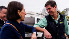 Premier Gladys Berejiklian bumps elbows with Nationals candidate Dave Layzell.