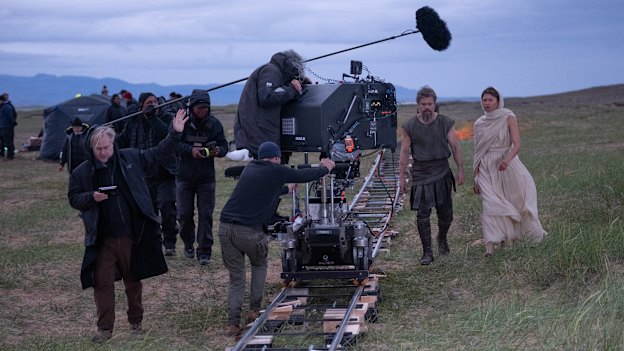 Director Christopher Nolan (frame left) with Matt Damon (as Odysseus) and Zendaya (as Athena), on set of his epic new film The Odyssey.