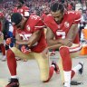 San Francisco 49ers safety Eric Reid (35) and quarterback Colin Kaepernick (7) kneel during the national anthem in 2016.