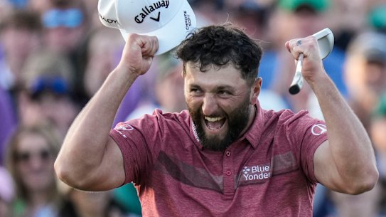 Jon Rahm celebrates on the final hole of The Masters.