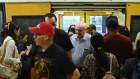Commuters pile into packed trains at Kogarah.