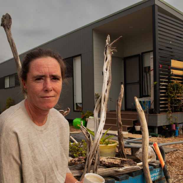 Brooke Robinson at her temporary modular house in Mallacoota. 