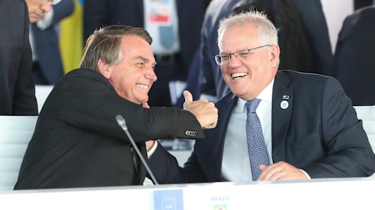 President of Brazil Jair Bolsonaro and Prime Minister Scott Morrison in discussion during the plenary session at the G20 Summit in Rome.