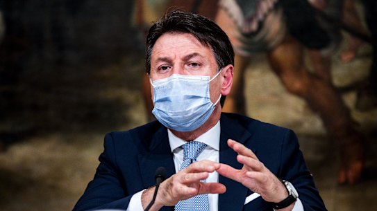 Italian Premier Giuseppe Conte announces new restrictions to curb the spread of coronavirus, in Rome.