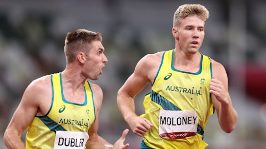 Ash Moloney is encouraged by teammate Cedric Dubler in the last event of the decathlon.