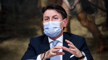 Italian Premier Giuseppe Conte announces new restrictions to curb the spread of coronavirus, in Rome.