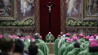 Pope Francis celebrates Mass at the Vatican on Sunday. The Pope has promised new laws that will ensure “no abuse should ever be covered up as was often the case in the past”.