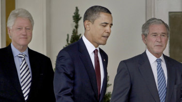 Attacked: Then-President Barack Obama, centre, walks out of the Oval Office of the White House with former presidents Bill Clinton, left, and George W. Bush in 2010.