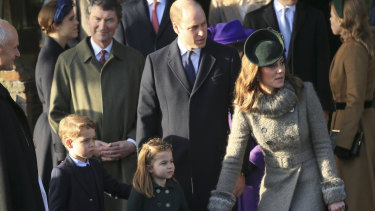 Britain's Prince William, Duke of Cambridge and Catherine, Duchess of Cambridge stand with their children Prince George and Princess Charlotte outside the St Mary Magdalene Church in Sandringham.