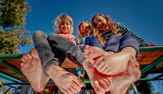 Frances Healey, 4, with Charlotte Broadhurst, 5, and Annika Steele, 4, at East Brunswick Kindergarten. 