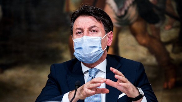 Italian Premier Giuseppe Conte announces new restrictions to curb the spread of coronavirus, in Rome.