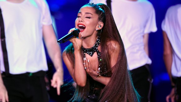Ariana Grande has said her ponytail leaves her in "constant pain".