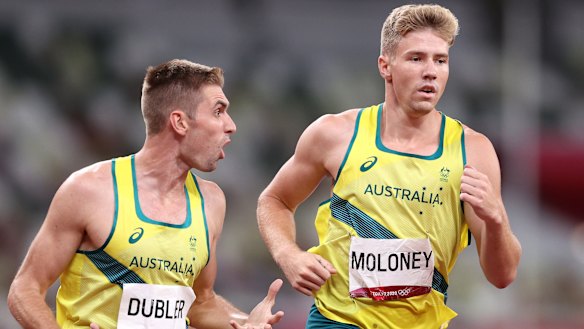 Ash Moloney is encouraged by teammate Cedric Dubler in the last event of the decathlon.