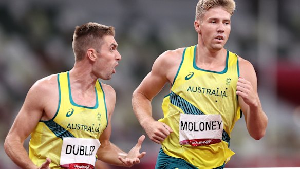 Ash Moloney is encouraged by teammate Cedric Dubler in the last event of the decathlon.