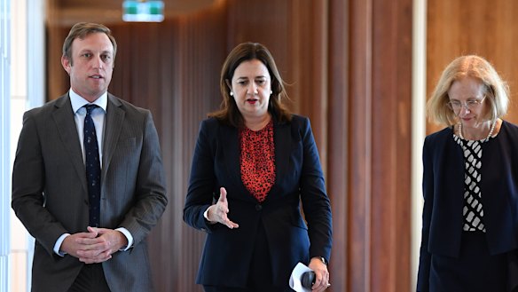 Queensland Health Minister Steven Miles, Premier Annastacia Palaszczuk and Chief Health Officer Dr Jeannette Young leave a press conference after a meeting of the Health and Safety cabinet committee.