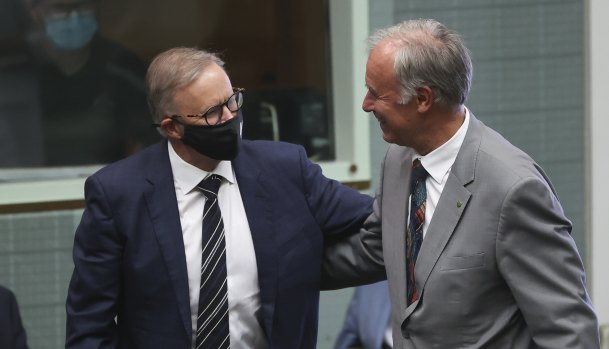 Opposition Leader Anthony Albanese congratulates Liberal MP John Alexander after he delivered his valedictory speech in the House of Representatives at Parliament House in Canberra.