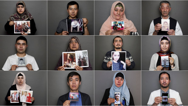 Uighurs holding up photos of relatives who are missing, in internment camps or have passed away.