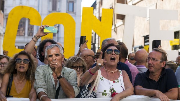 Five-Star movement's supporters rally outside the Senate in Rome.